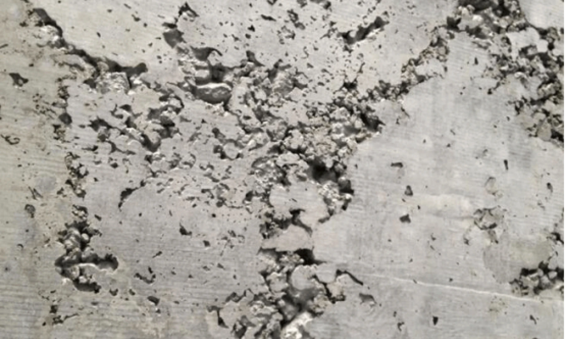 Concrete surface defects allowing corrosion